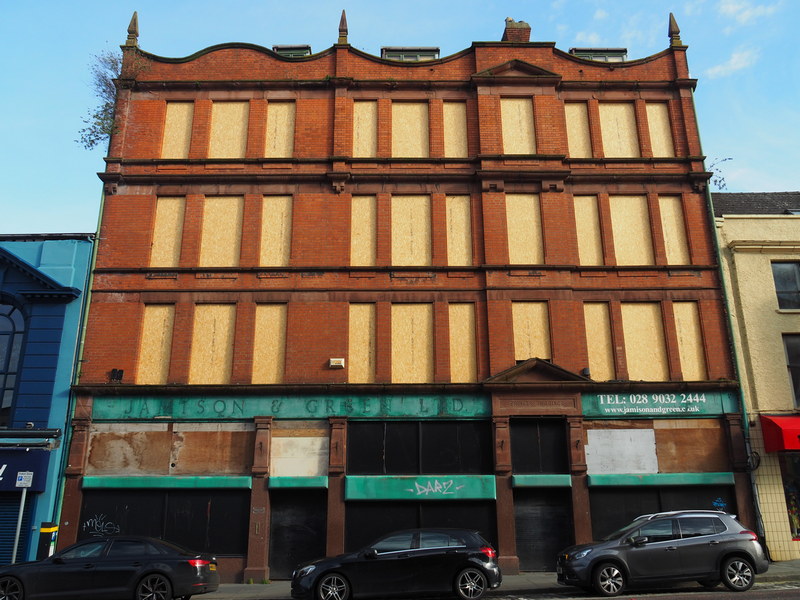 Belfast_Rubble's tweet photo. The former Jamison &amp; Green Ltd premises,  Prince’s Buildings 102-108 Ann St. Acquired in 2019 by Glendola Leisure and Carlton Hotel Collection  (owners of the adjacent Tipsy Bird) it's starting to look like it's being modelled on the failed George Best Hotel. Or land-banked ☹️ https://t.co/MD8doYTxcF