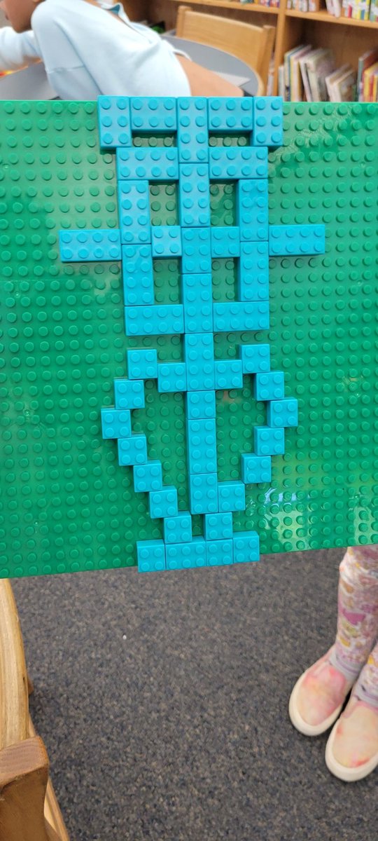 CopasSPESLibary's tweet photo. Math in the library!?! Yep, we do it all! 2nd grade read Looking for Symmetry, then made some symmetrical designs with Legos. @SpotswoodElem https://t.co/f72xhtyipy
