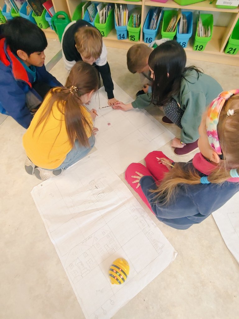 MsKThiel's tweet photo. Partner Power! Gr. 2 experts teach Gr. 4/5s how to program bee-bots. Together, Ss map a community. 

Focus on Direction: N/S/E/W (2s), Habitats: green spaces for local species (4s), Levels of Gov't: designing safe parks (5s) and so much more! @StAgnesCES #wcdsbNTIP #WCDSBAwaken https://t.co/Iuz8DoERc9
