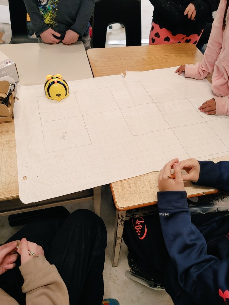 MsKThiel's tweet photo. Partner Power! Gr. 2 experts teach Gr. 4/5s how to program bee-bots. Together, Ss map a community. 

Focus on Direction: N/S/E/W (2s), Habitats: green spaces for local species (4s), Levels of Gov't: designing safe parks (5s) and so much more! @StAgnesCES #wcdsbNTIP #WCDSBAwaken https://t.co/Iuz8DoERc9