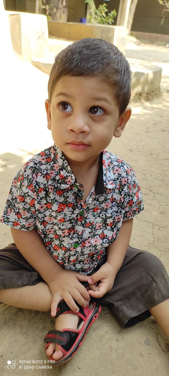 On Eid day in the yard of our village home...