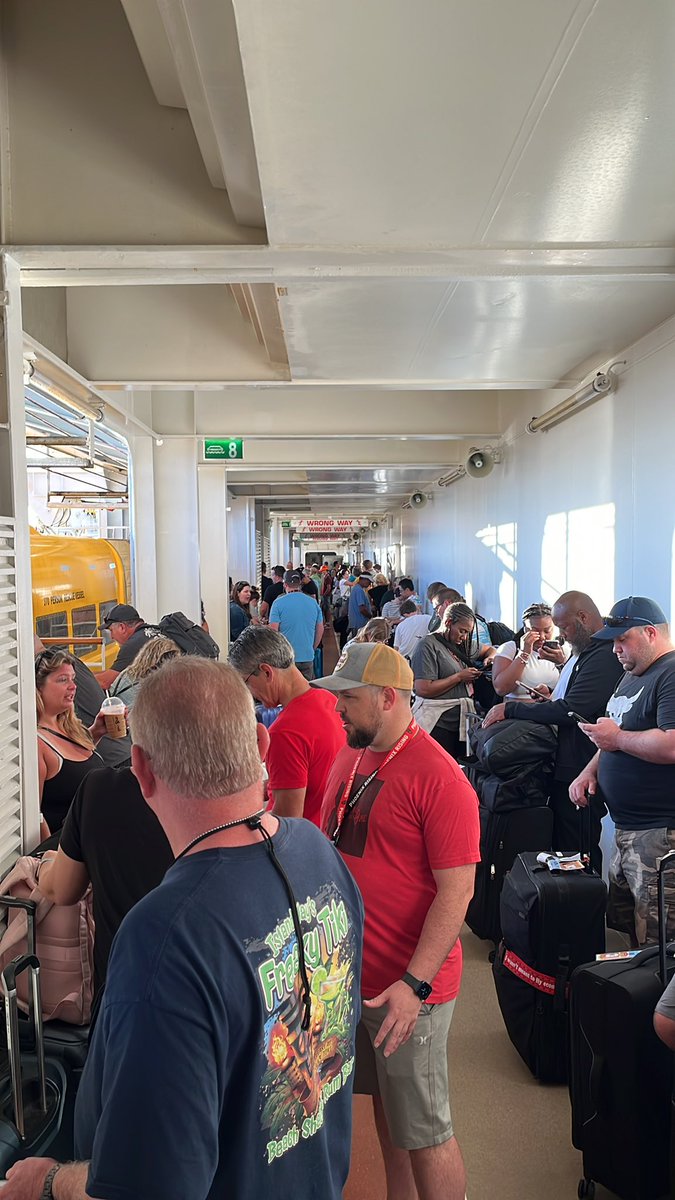 funflynns's tweet photo. @RoyalCaribbean  prepare yourselves for a flood of complaints. Can't get off the ship and a thousand people backed up already at 7am. #shitshow https://t.co/JbbeYi0kJC