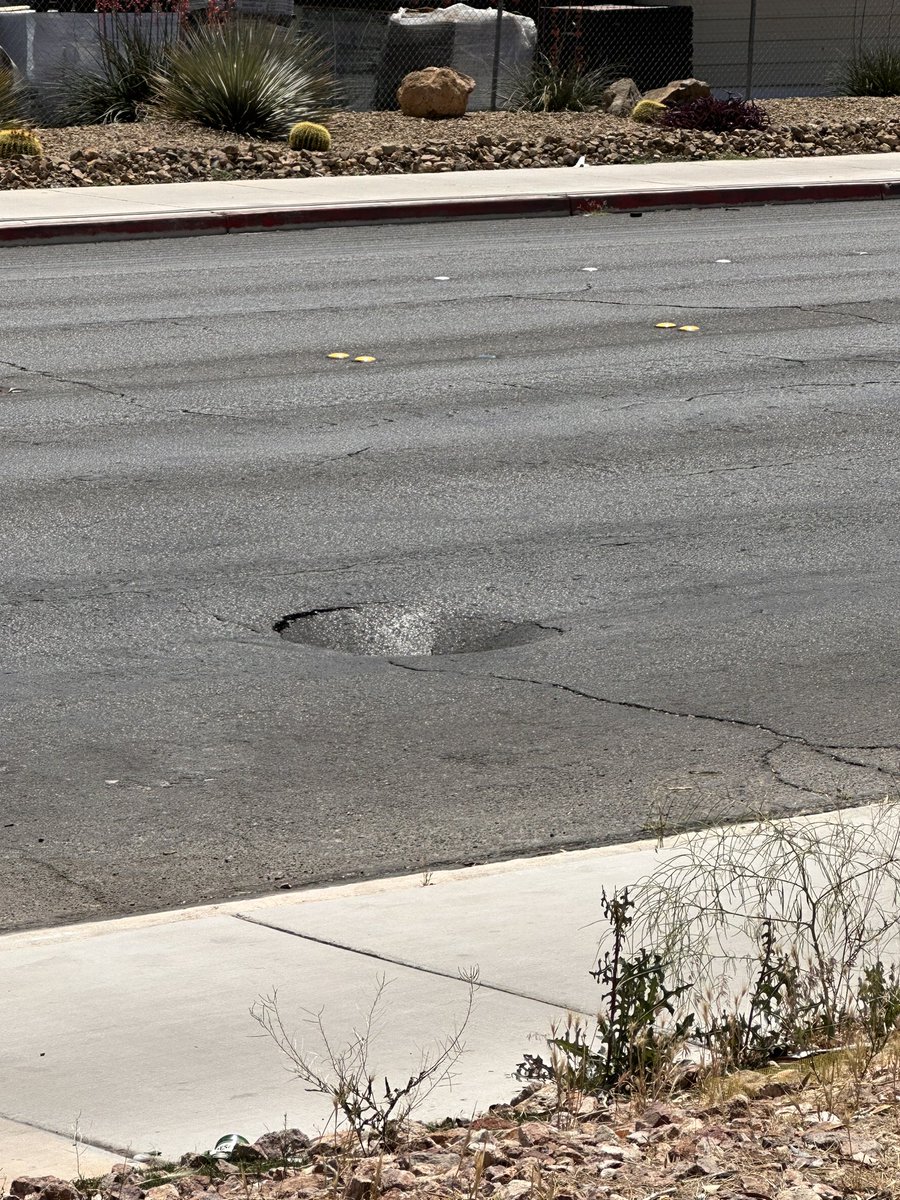 DemonDeprived's tweet photo. @nevadadot there's a pothole/ potential sinkhole on highland drive between W Red Oak Ave and FDNA Lane. Hard to tell from photos but it's hollow underneath!!! Almost made me crash https://t.co/4f6Opu8Tj6