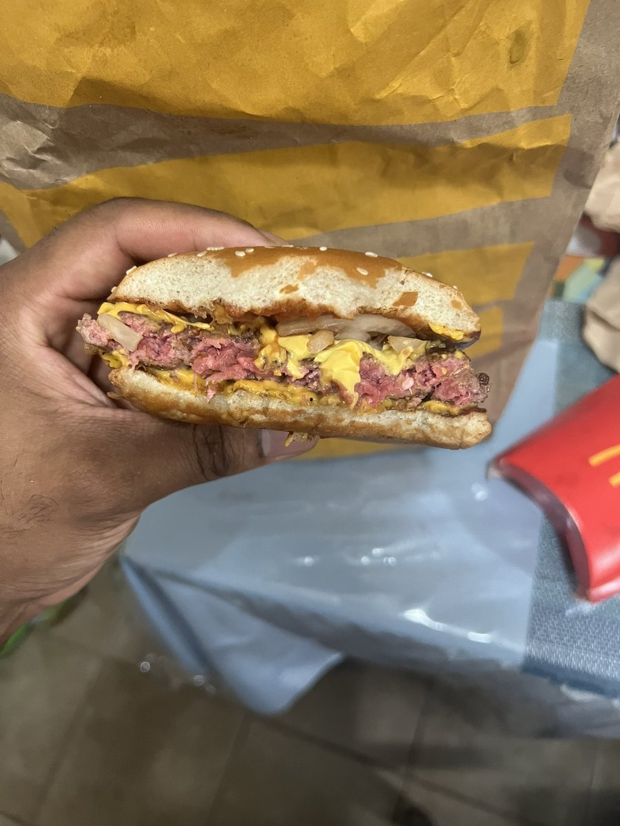 JakMeyoff's tweet photo. @McDonalds is this how you prepare your food?!  Meat wasn’t even cooked. https://t.co/7lWr5pJ8Fk