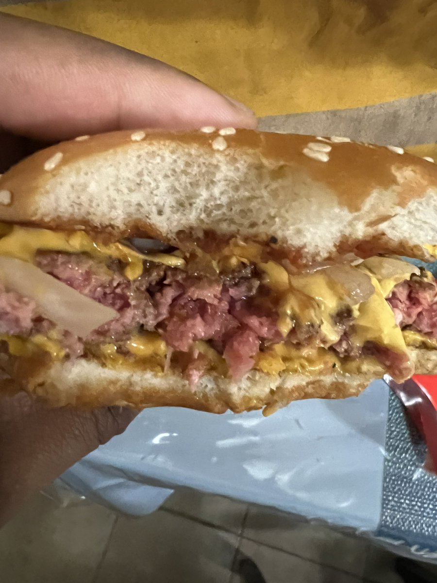 JakMeyoff's tweet photo. @McDonalds is this how you prepare your food?!  Meat wasn’t even cooked. https://t.co/7lWr5pJ8Fk