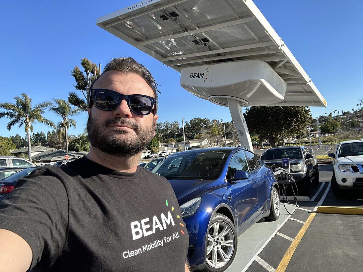 ChargePozitive's tweet photo. These @gosunbolt #Solar workstations tables are pretty cool (more than my new glasses). Would LOVE to see these at freeway #RestStops and other sorts of picnic areas alongside @BeamForAll powered #SolarPower #EVcharging stations! https://t.co/y5JVi4qnkH