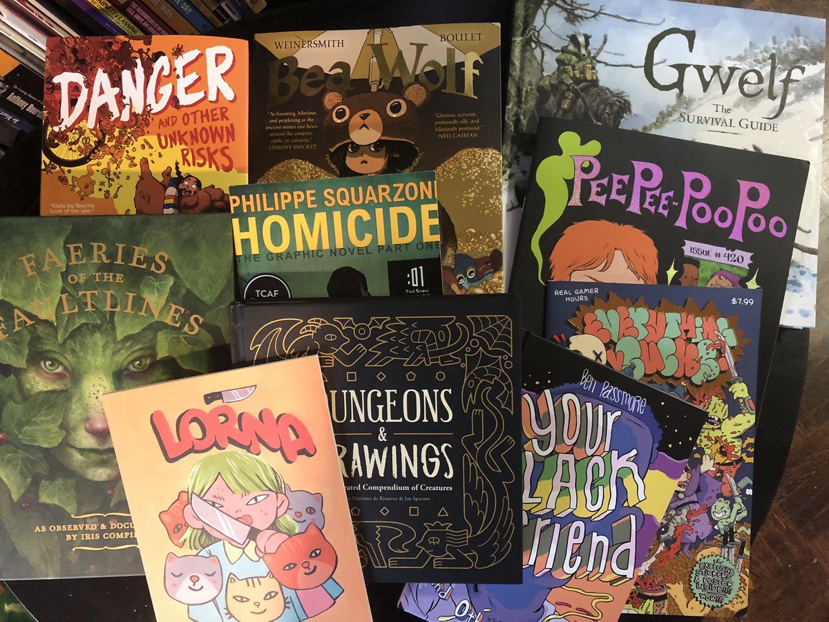 inkstainedjeans's tweet photo. I really love #TCAF2023. There are very few things I can blow my budget on that make me so happy, but a foot tall stack of new books and some great prints hits the spot https://t.co/OhKBUtQq9b