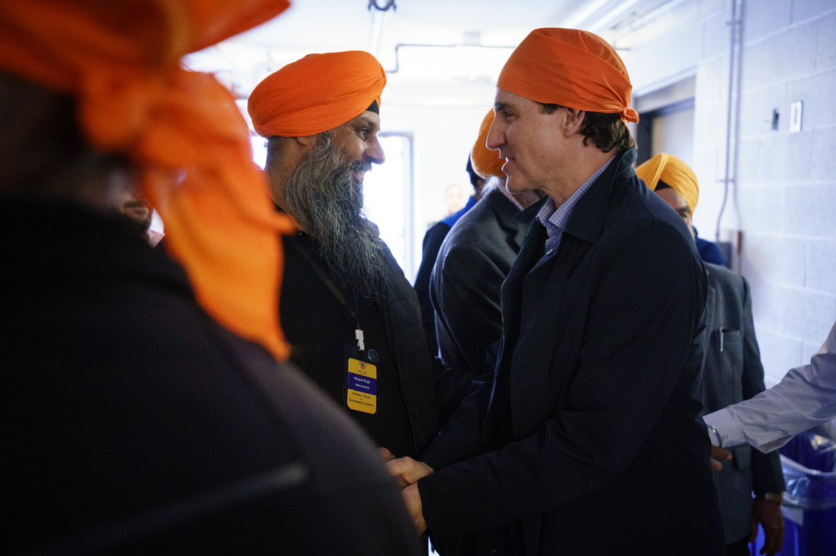 JustinTrudeau's tweet photo. From Vancouver to Edmonton to Toronto, I have fond memories of attending Vaisakhi celebrations. Today, we were back in Toronto for this year’s Khalsa Day parade – celebrating with friends old and new. Happy Vaisakhi! https://t.co/wWgEDEuJOo