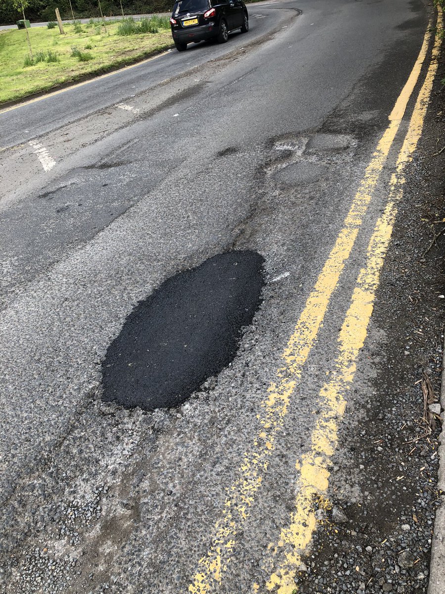 This, in @cheshamtown, is what passes for pothole repairs… it’s like they just threw some tarmac in the general direction of the biggest pothole and buggered off home when they ran out.