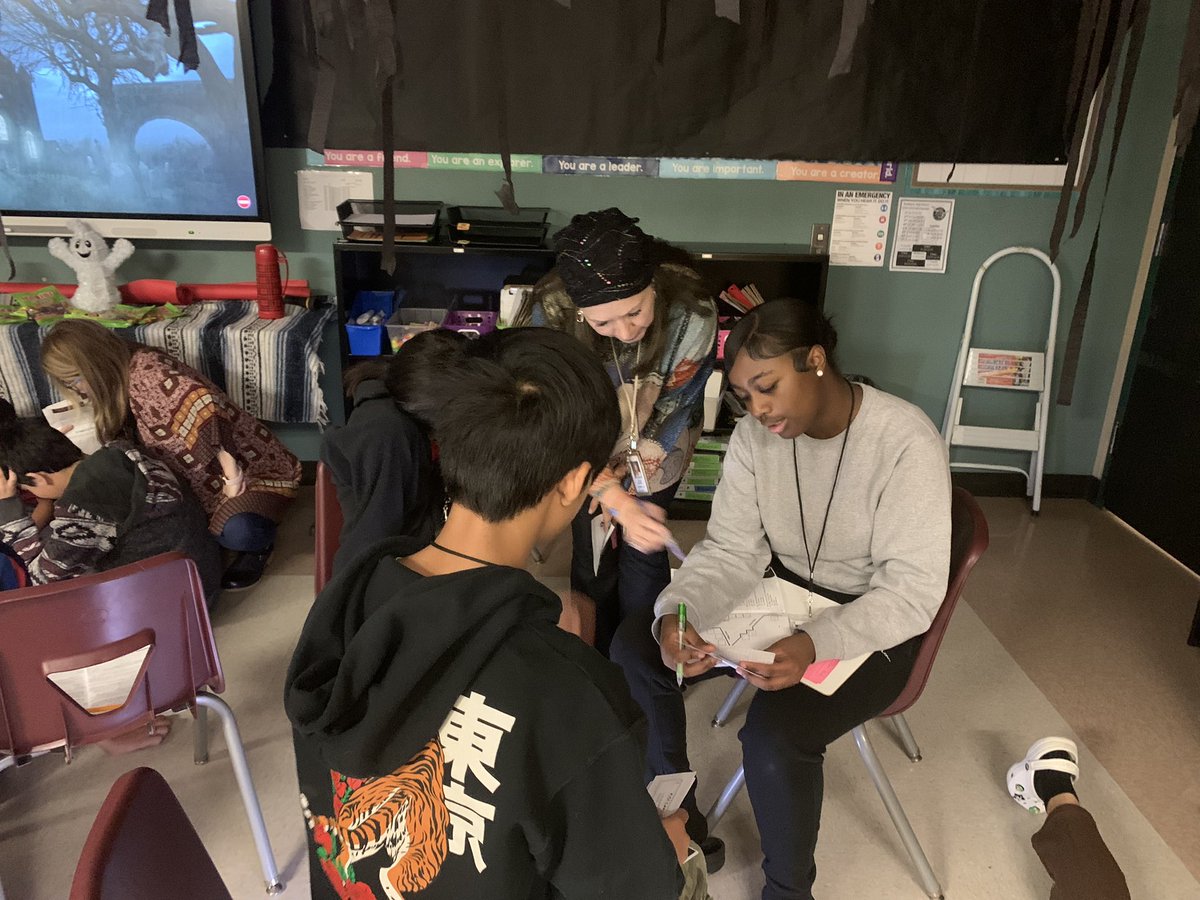RJHlonghorns's tweet photo. Our 7th ELAR teachers transform their classrooms into Camp Reading last week discussing plot and authors purpose! #collaboration #RJHgameon https://t.co/mbkVP50d2i