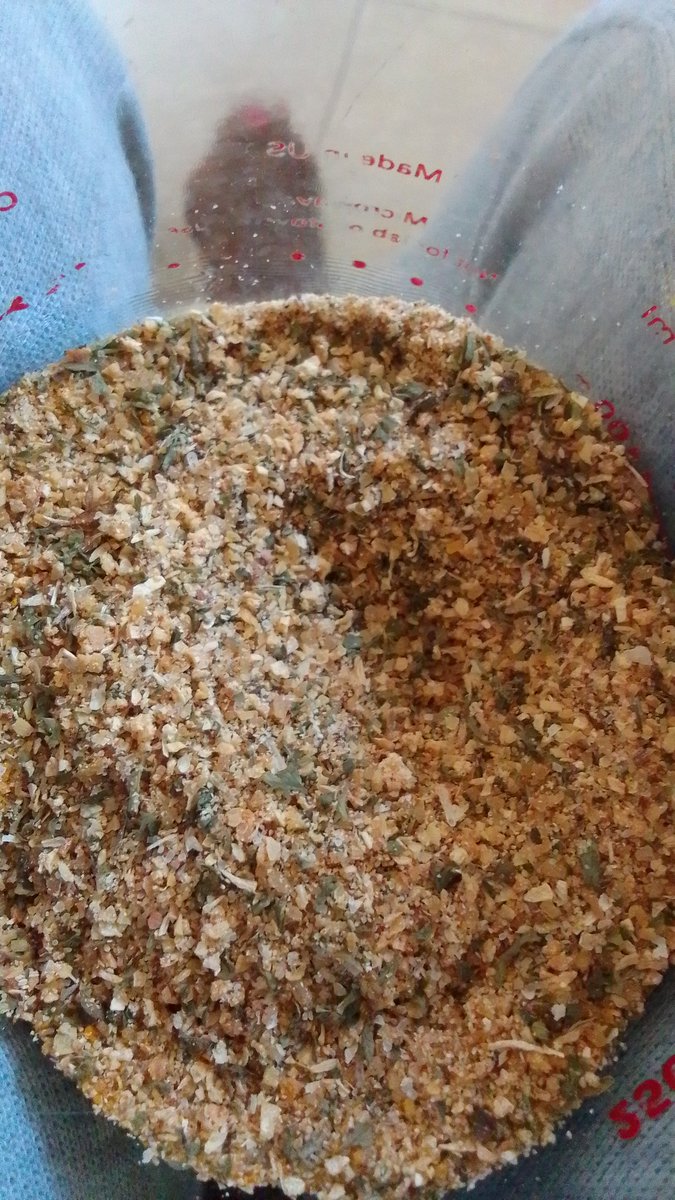 Herbs from the garden and fellow BYG being turned into seasoning mix