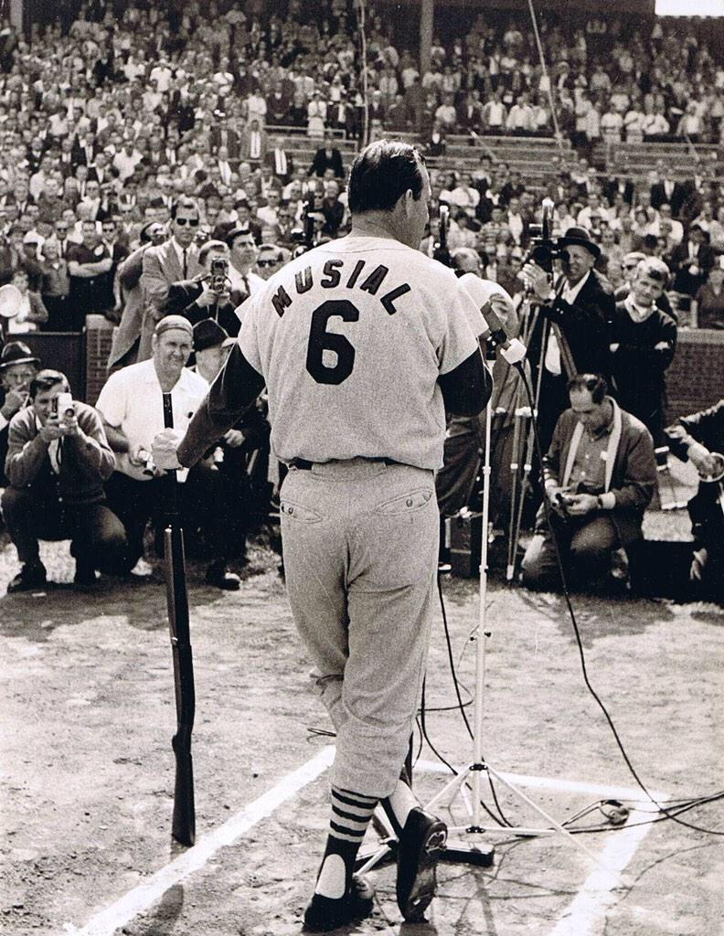 AugieNash's tweet photo. #OTD 1963 - Stan Musial speaks to the Wrigley Field crowd before his final game in Chicago.

He was lavished with gifts including the shotgun he is leaning on.

The other gifts the Cubs gave him was the 492 career hits he got against them! 🤣 #STLCards https://t.co/kQ05WgWe9h