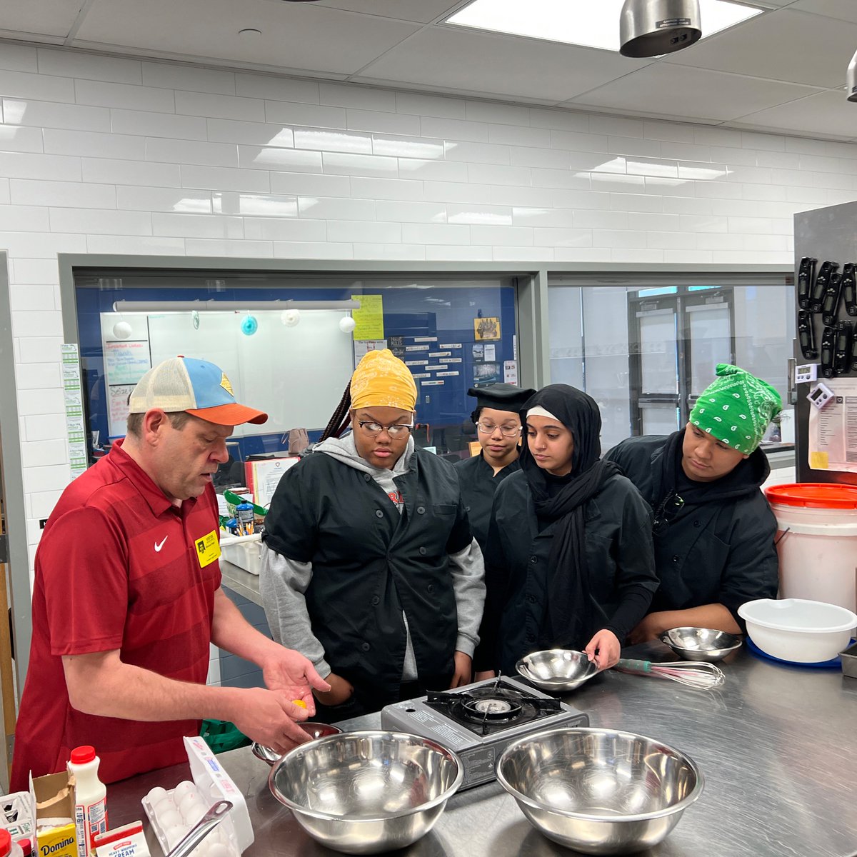 LYNXFHS's tweet photo. LYNX scholars in Culinary 2 worked with Chef Niko Negas to learn how to create a reliable ice cream base in preparation for their ice cream making competition! @RoastHousePub @UMPHFrederick https://t.co/8g6OnxWoKX