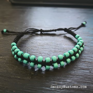 Turquoise and Black Braided Bracelet   My favorite colors 😍Available at SmokeyKustoms.com  Because I can't keep everything I make