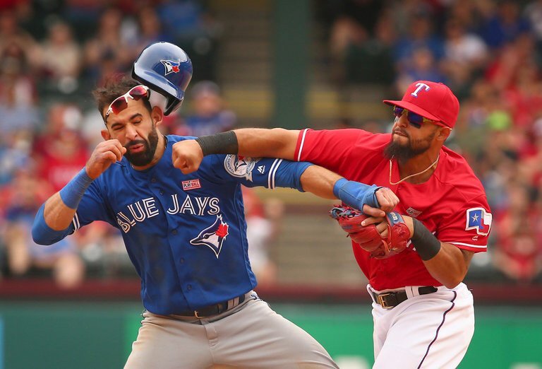 baseballinpix's tweet photo. Rougned Odor punches Jose Bautista before a brawl breaks out, 2016 https://t.co/awgYXh9VOQ