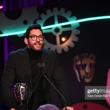 Dorisd_r's tweet photo. Beautiful photos of #TomEllis receiving an award for Top Boy director William Stephen Smith at the BAFTA Television Craft Awards tonight.Tom in black always looked stunning. We remember this from #Lucifer6 - the scene on Lux's balcony with Dan❤️🔥🥹 https://t.co/l9X1uTSAt9