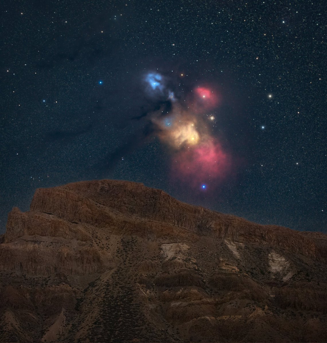 SP61Photography's tweet photo. Rho Ophiuchi rising above Alto de Guajara, Tenerife. Captured with star adventurer pro tracker, #canon T7i, and a Canon 70-200mm lens. 90 minutes of exposures stacked and edited, blended with the mountain (shot after from same tripod position)
#deepscape #astrophotography #astro https://t.co/OPrC1jDp9q