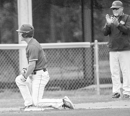 MichaelGPaul's tweet photo. BCC coach Robbie Allen @bcc_dolphins  applauds as Bryson Horney hits a run-scoring triple in the 5-3 victory against Richard Bland. https://t.co/5b6IEpVKoG