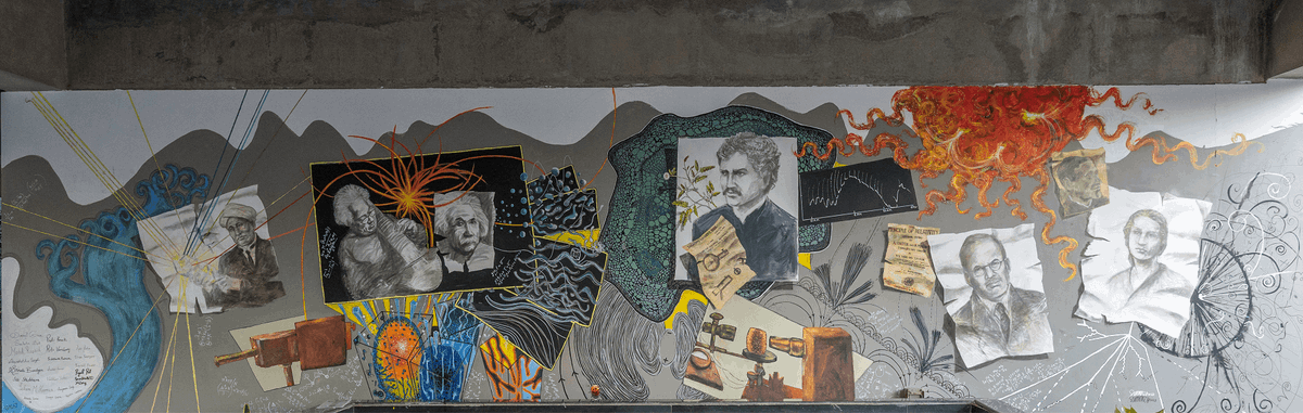 iitgn's tweet photo. IITGN  features a new mural in the campus depicting the birth of modern Physics in colonial India. Conceptualized and designed by Argha Manna, Artist-in-Residence, @HSSiitgn, it was painted by him, artist Suman Chowdhury, and IITGN’s faculty members and students.
#MuralAtIITGN https://t.co/VnKK3mf4iQ