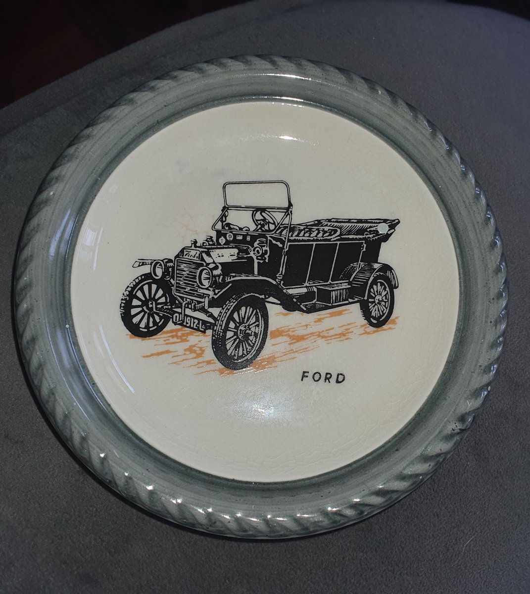 tyrrell005's tweet image. I have this for sale. It&apos;s a small ceramic dish made by Wade Pottery in the UK in the 1960s. It features picture + info of a 1912 Ford Model T. Despite it&apos;s age it&apos;s in great condition. Price is 1,500 Kenyan shillings or equivalent. #wadepottery #fordmodelt