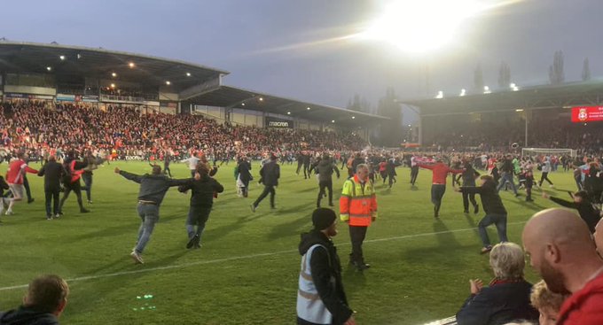 Moneypenny - 2 pic. So many of our team were lucky enough to see @Wrexham_AFC's big win in person this weekend - what a day 😍 COYR ❤️🤍⚽️ #upthetown #champions #WxmAFC https://t.co/koamPjsL59