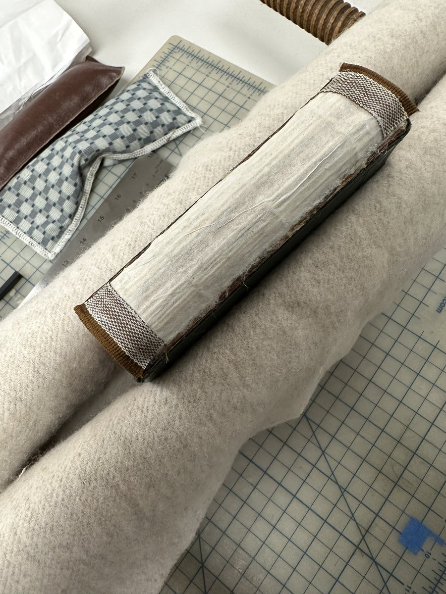 Spurgeon book restoration @ SWBTLibraries. Discovered it needs another strip of heavier weight Kozo on the spine to insure structure. Matching color to period headbands were replaced.  Allowing to dry. Always placed between soft felt for maximum protection of the leather cover.