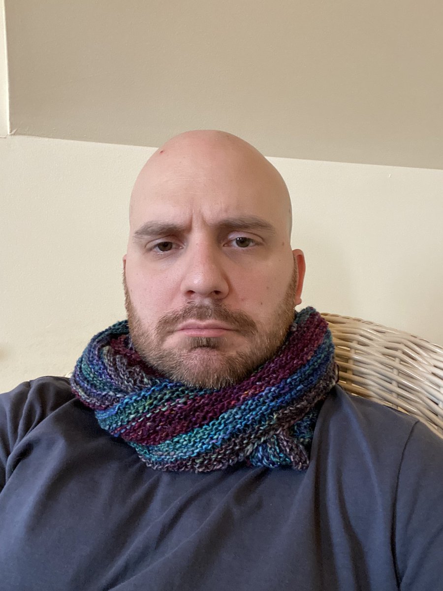 Dog chewed up the kid’s infinite scarf, so I unwound the yarn, tied the pieces back together, and made a new infinite scarf.