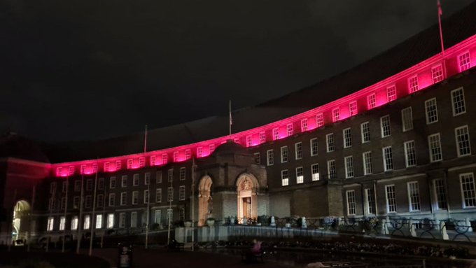 Bristol's City Hall is pictured, lit up red.