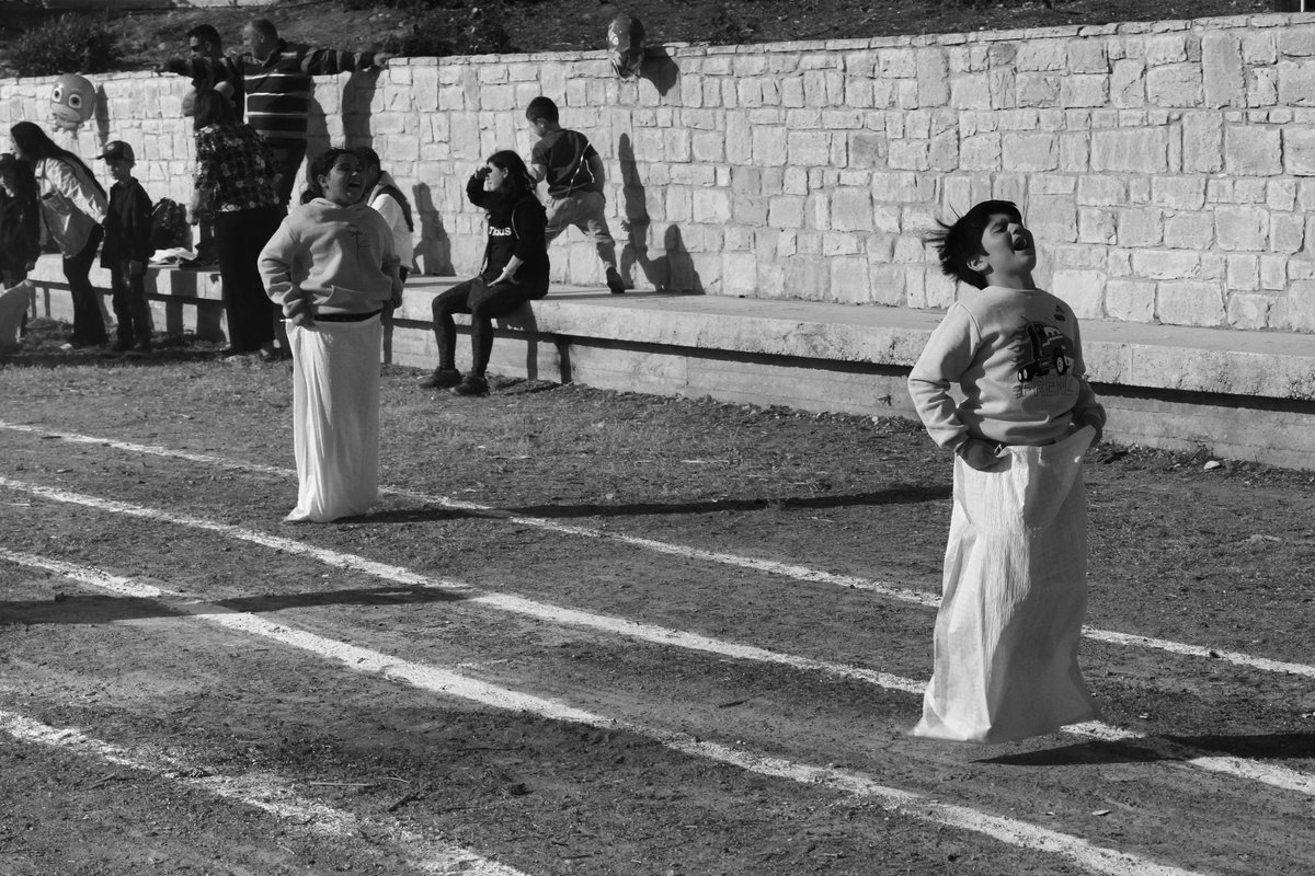 Sack race Easter Sunday Kissonerga Paphos Cyprus ..#kissonerga #paphos  #cyprus #eastersunday #sackrace #henricartierbresson #decisivemoment #childhoodmemories