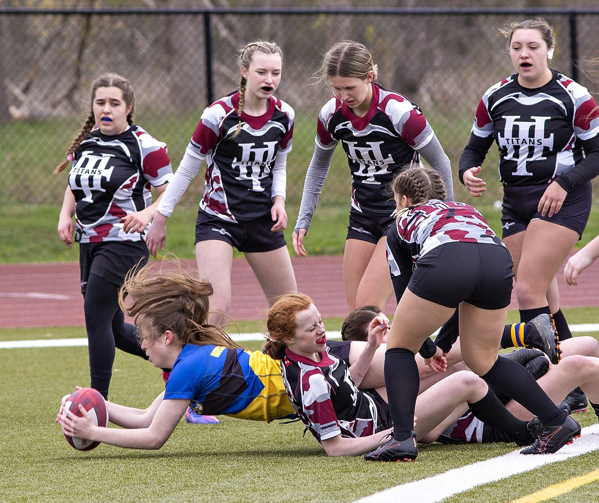 EXPbthompson's tweet photo. @BCIVS ball carrier Georgia Smith scores a try during AABHN high school girls #rugby action in #brantford against Holy Trinity (Simcoe). Also pictured is Titan's Taylor Devereaux on the run. BCI won 34-0. @TheExpositor @Simcoe_Reformer https://t.co/t50a2wz6nq