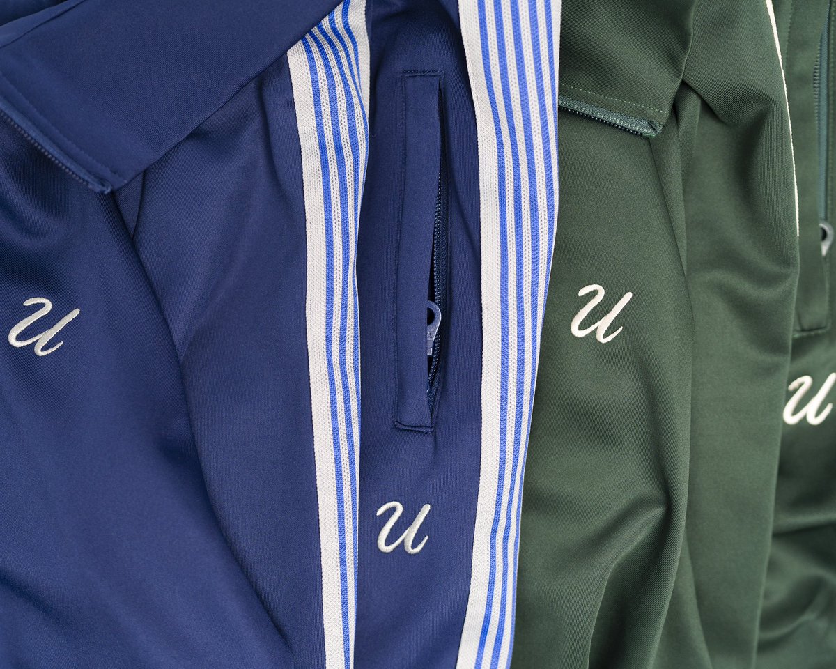 KadeemPrime's tweet photo. Blooming ‘U’ Tracksuits in blue and green. Available this Friday at Noon EST on https://t.co/p5OvX0wJqv https://t.co/zQiPuPTNIh