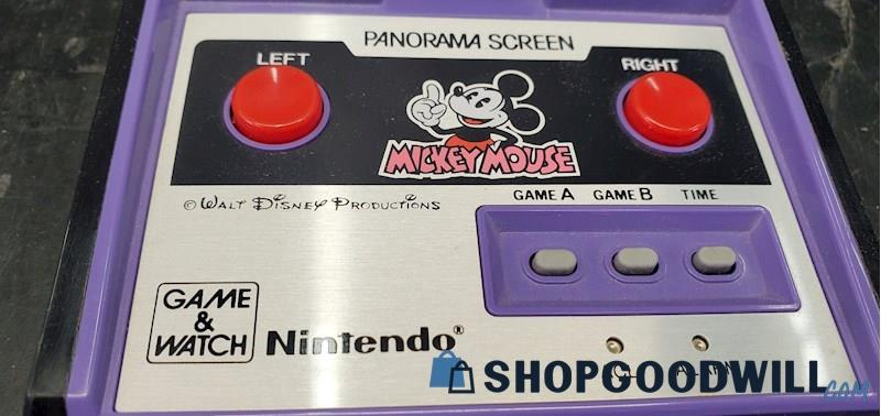 GoodwillGoblin's tweet photo. Game &amp; Watch Model DC-95, Panorama Screen Mickey Mouse, has appeared on Shop Goodwill. Panorama models had color screens that reflected off a mirror to increase visibility in lieu of a backlight. (last picture courtesy https://t.co/pPx5bfPQmy) https://t.co/ypBk01BJoA