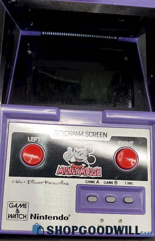 GoodwillGoblin's tweet photo. Game &amp; Watch Model DC-95, Panorama Screen Mickey Mouse, has appeared on Shop Goodwill. Panorama models had color screens that reflected off a mirror to increase visibility in lieu of a backlight. (last picture courtesy https://t.co/pPx5bfPQmy) https://t.co/ypBk01BJoA