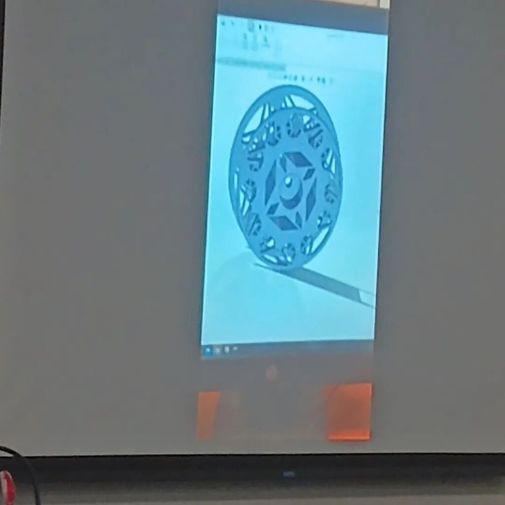 Alex presenting on his custom fly fishing reel design. instagr.am/p/CrbhnxbOw0d/