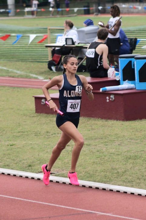 RavensXCTnF's tweet photo. After four years of cross country and four years of track and field, Nathalia Mallo is not done. Mallo signed her NLI today with Pasco Hernando State College and will compete at the NJCAA level next year. Congrats Nathalia! #NextlevelRavens https://t.co/UgDm6AulUR