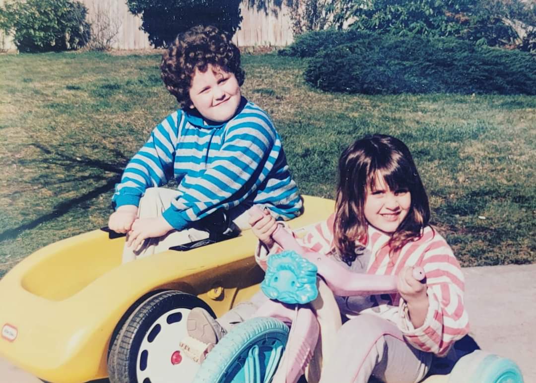 My little sister and I were always ready to pull up. 

Not pictured: the semiautomatic nerf turf sweeper tucked in the trunk.