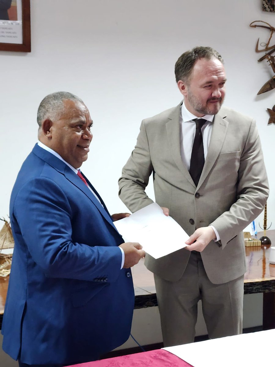 Foreign Minister Napat hands over Vanuatu's Declaration to joining the Beyond Oil & Gas Alliance (BOGA) to the Danish Minister for Development Cooperation and Global Climate Policy, Hon. Dan Jørgensen. BOGA is co-chaired by Denmark.