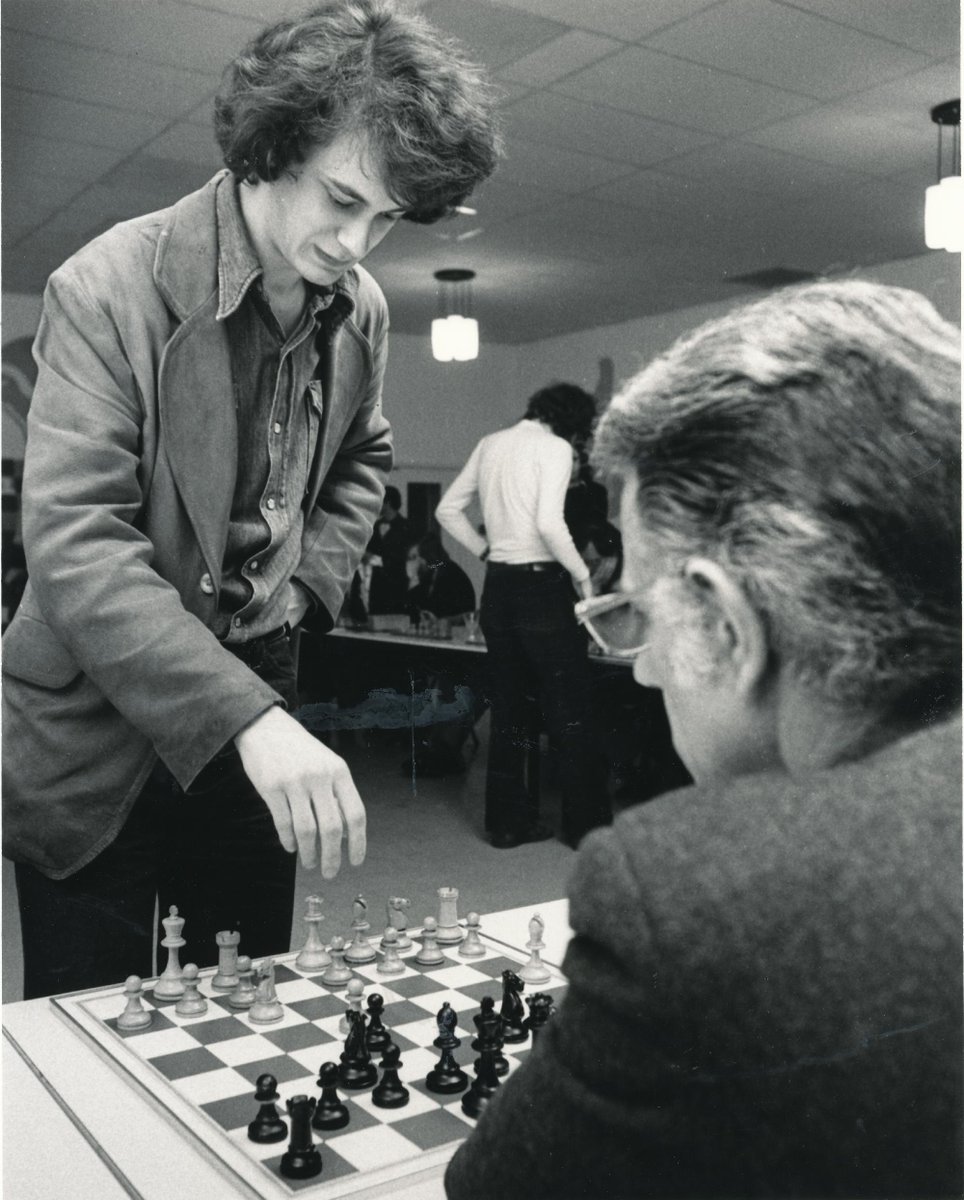 John Nunn (25 April 1955) is an English chess grandmaster, a world champion in chess problem solving, a chess writer and publisher, and a mathematician. He was the European Junior Chess Champion and British champion. He beat Karpov, Anand and drew with Kasparov, Spassky, Kramnik.