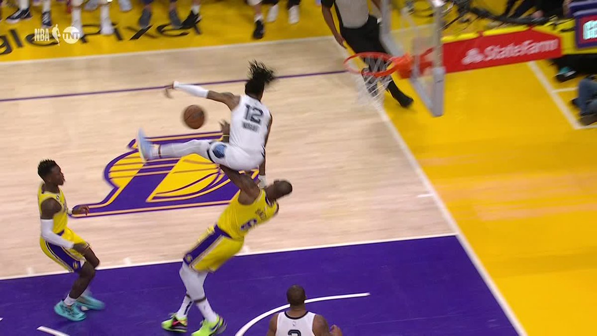 SportsCenter's tweet image. Ja tried to jump over Bron 😳