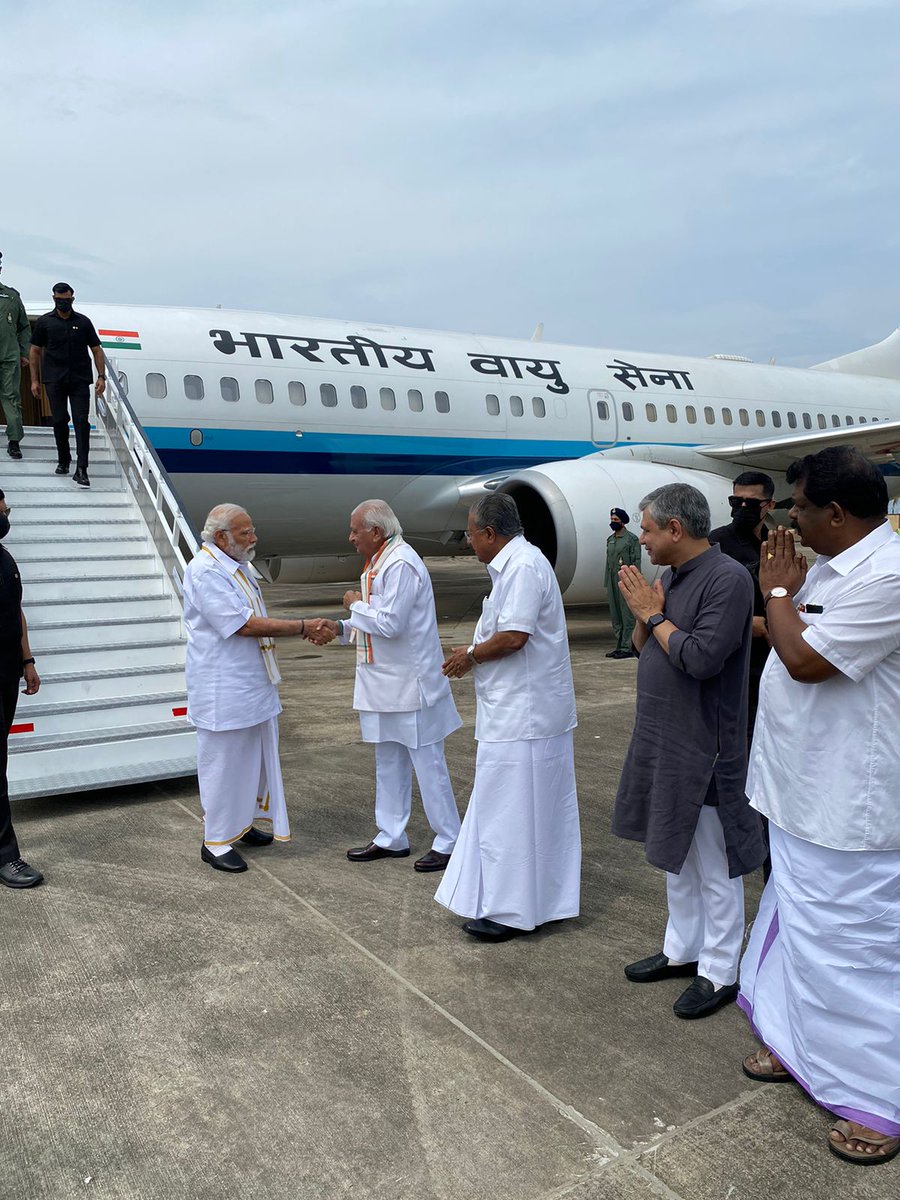 PMOIndia's tweet photo. PM @narendramodi landed in Thiruvananthapuram a short while ago. He was welcomed by @KeralaGovernor Shri Arif Mohammed Khan, CM Shri @pinarayivijayan, Union Minister Shri @AshwiniVaishnaw and Lok Sabha MP Shri @ShashiTharoor. https://t.co/vIEU89n48S