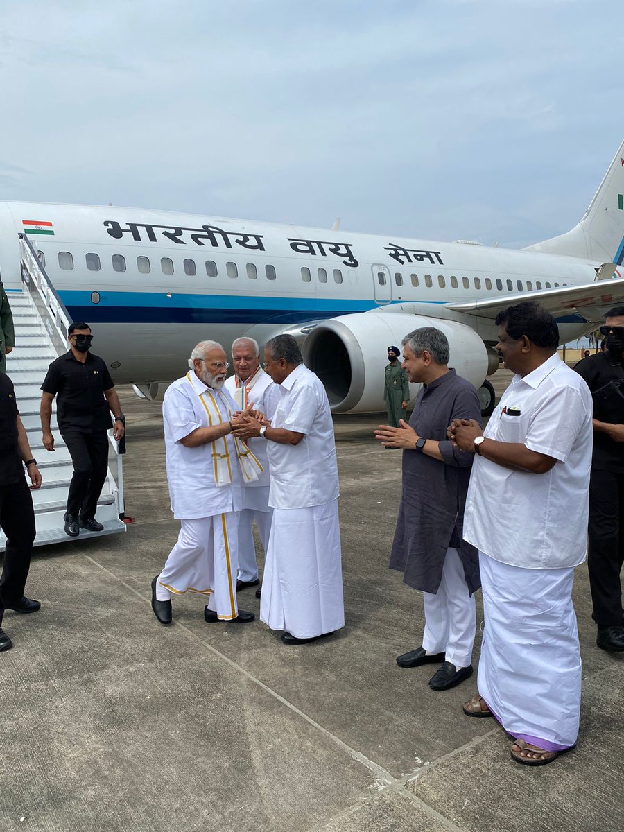 PMOIndia's tweet photo. PM @narendramodi landed in Thiruvananthapuram a short while ago. He was welcomed by @KeralaGovernor Shri Arif Mohammed Khan, CM Shri @pinarayivijayan, Union Minister Shri @AshwiniVaishnaw and Lok Sabha MP Shri @ShashiTharoor. https://t.co/vIEU89n48S