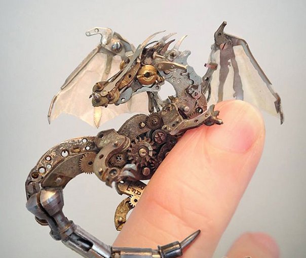 Steampunk dragon by US artist Sue Beatrice who creates steampunk sculptures and jewellery by recycling old watch parts #WomensArt