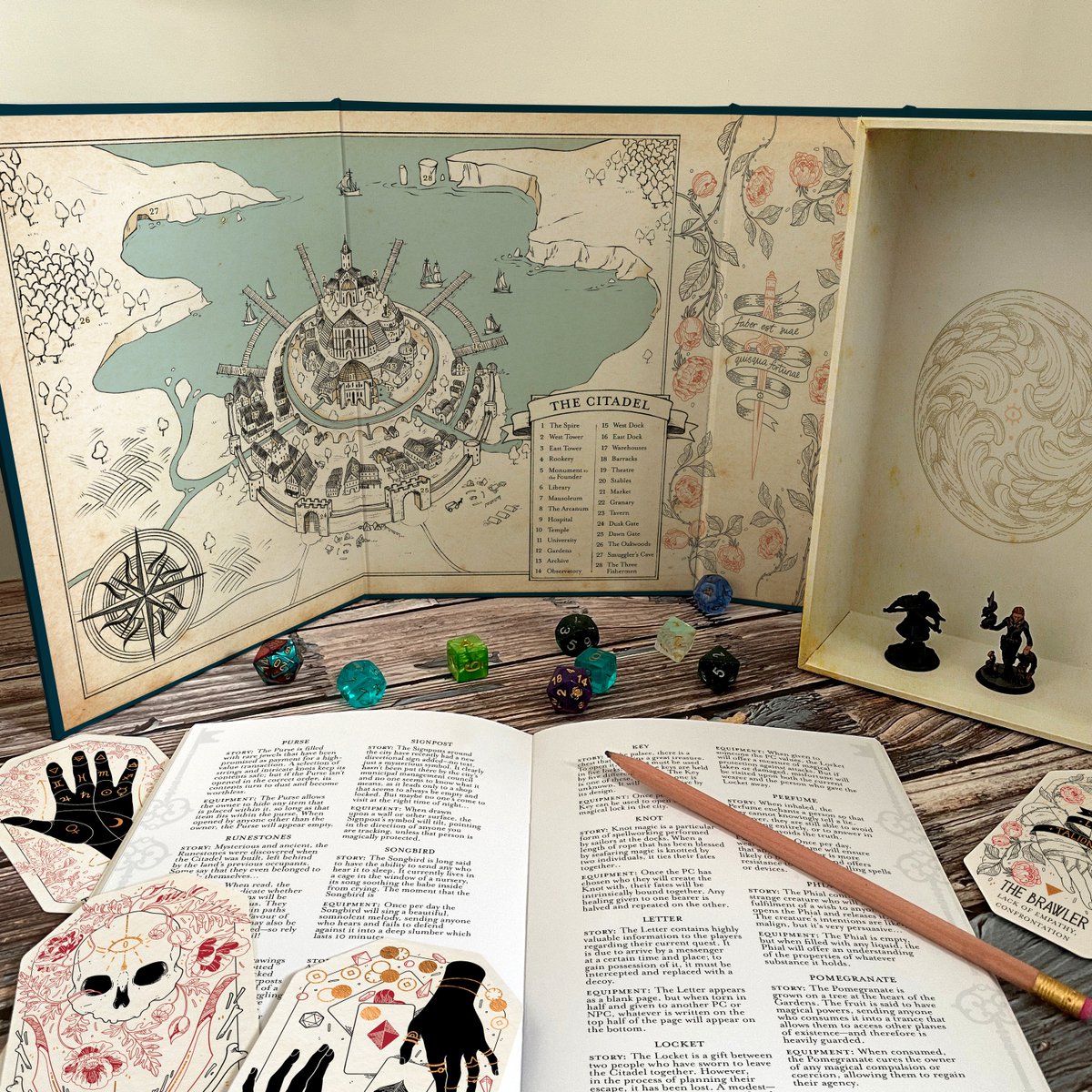 Rosdottir's tweet image. So I made a new oracle deck and the special edition is published today! It&apos;s got two #DnD-inspired decks, a system-neutral short campaign, a box that doubles as a DM-screen, and a cool lil yes/no coin!
✨Free worldwide shipping✨ liminal11.com/product/the-ci…