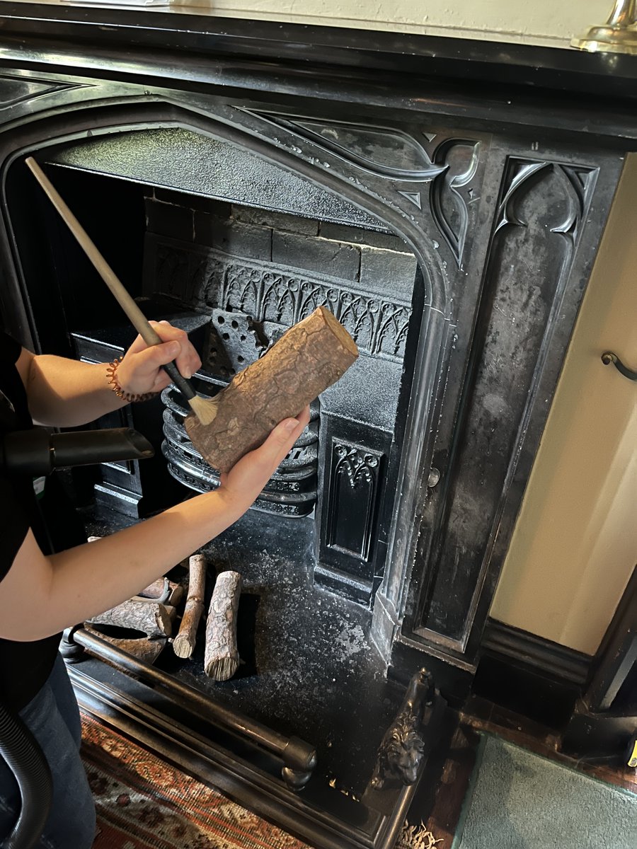 A lot of time and precision goes into the day-to-day cleaning and care of the collections. 
This morning one of our Collections Assistants cleaned the fireplace in the Ante Room. Special brushes and a vacuum cleaner to collect the dust ensures no damage is made to the surfaces.