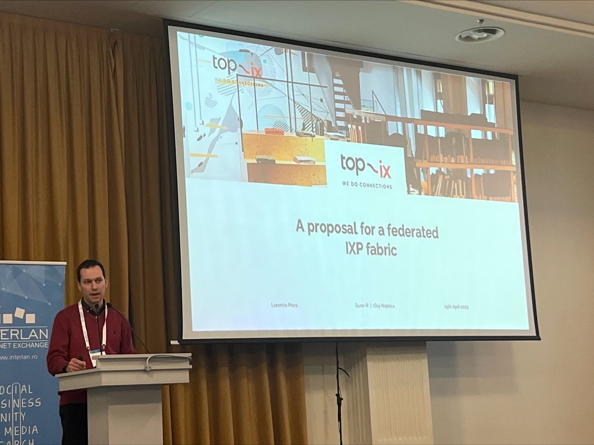 euroix's tweet photo. Presenting 'A proposal for a #Federated #IXP #Fabric', Lorenzo Moro of @top_ix is reminding the #community of previous discussions led by Kurtis Lindqvist of @LINX_Network on the future of #interconnects at #euroix36.
#trends #switchingfabric #governance #euroix38 https://t.co/nabWVXnUSk