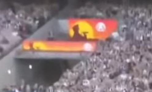 pauldamon1's tweet photo. @JGademski The Sign at MCG today. Just so happens to be so similar, accidental of course, of the aboriginal flag with sun, red sky and black silhouette of soldier blowing last post. Cunning bastards they are. https://t.co/StQrcus84w