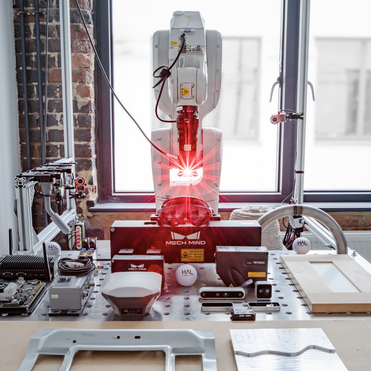 Central to our testing cell is, of course, the robot. We have an <a href="/ABBRobotics/">ABB Robotics</a> IRB 1200 with a great payload, reach and speed combo for us. It also has an excellent comms stack, often overlooked, which allows us to remotely upload code, run and monitor the robot.