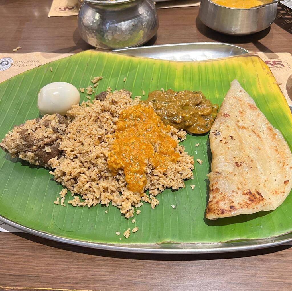JayMoyLovesFood's tweet photo. Thalappakatti is a chain restaurant that is very well-known for its different style of Biryani.

The Biryani here is made from a shorter grain rice, instead of the longer grain Basmati that you usually see.  That in turn creates a Biryani that is more mo… https://t.co/AZS4jggrLT https://t.co/PJQCdgSoMi