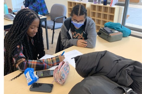 Studying and tutoring at St. Kateri Library.