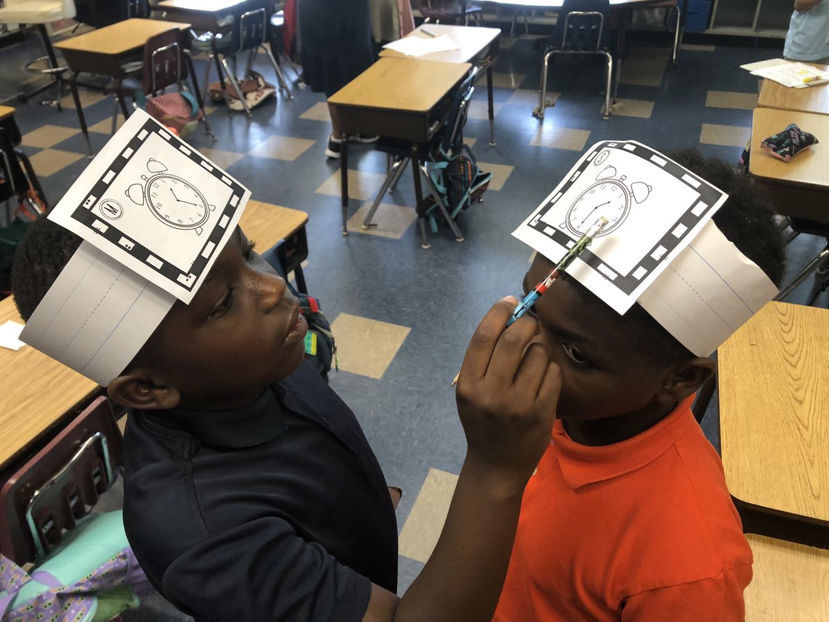 crousb's tweet photo. Today we were time telling travelers! We made clock bands to wear around the room. When the music stopped, we read the time on our partners band, recorded it, and checked our partners work! @LelyLionsRoar https://t.co/uCzK2h3yIw